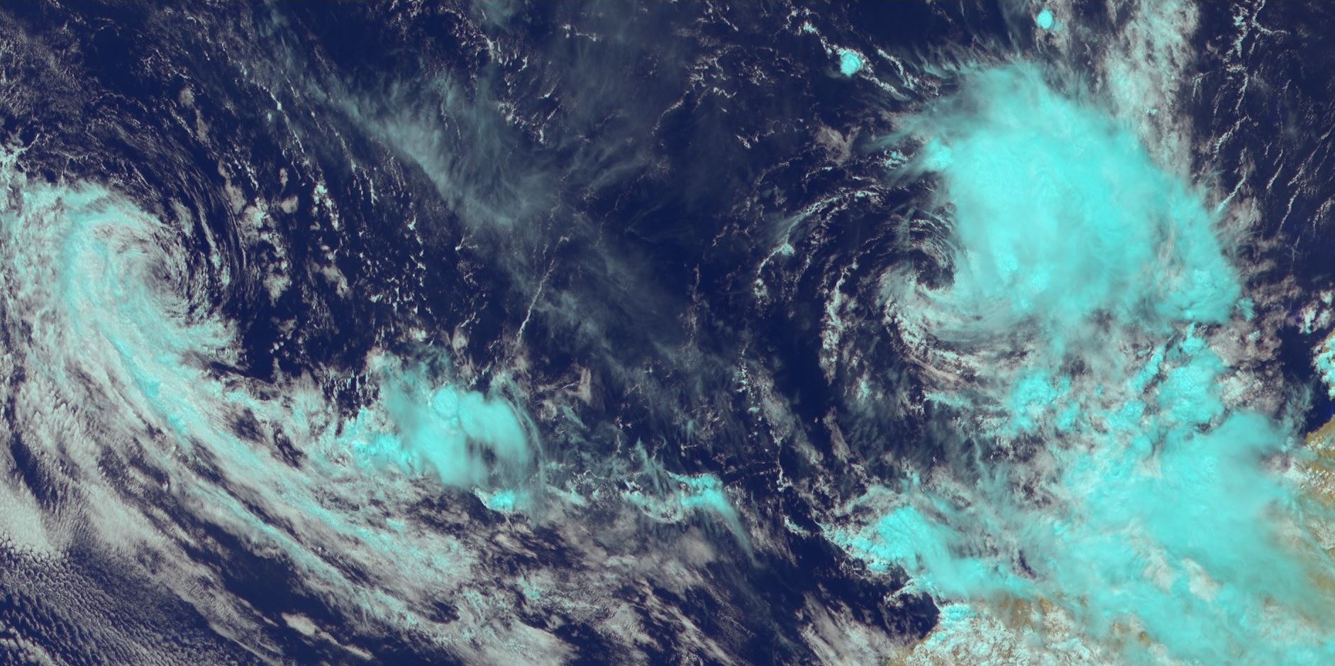 LEFT: REMNANTS OF TC WALLACE(23S). RIGHT: INVEST 98S.  HIMAWARI-8 AT 0350UTC